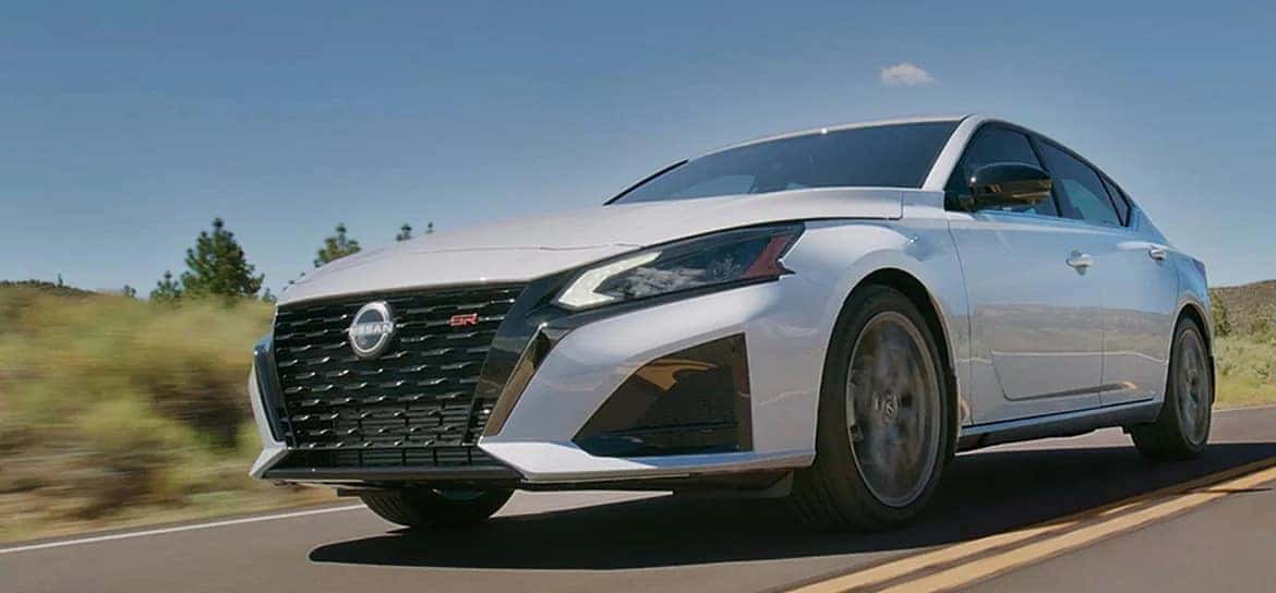 A 2025 Nissan Altima riding down a highway.