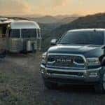 2018 Ram 2500 parked next to motor home trailer