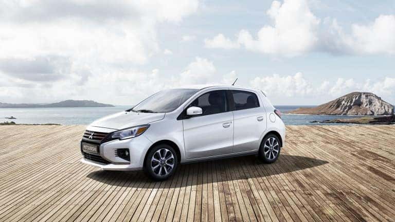 2021 Mitsubishi Mirage in white exterior parked on island port
