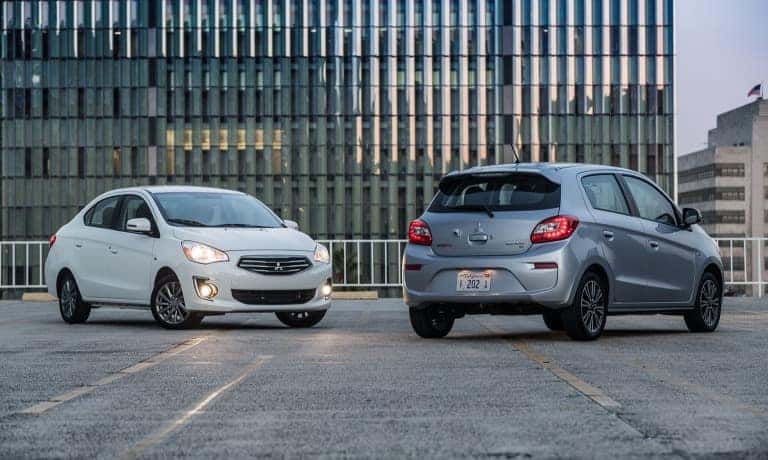 Mitsubishi Mirage G4 parked next side by side