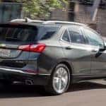 Chevy Equinox Driving Down Street