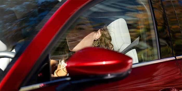 Woman driving a Mazda CX-30