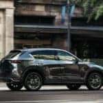 Mazda CX-5 Driving Down Street Through Town