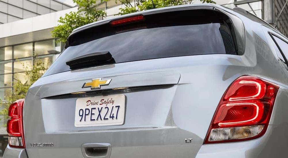 A close up of the rear of a silver 2021 Chevy Trax LT parked at a Huntsville Chevrolet dealer.