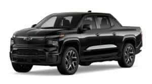 A black 2024 Chevy Silverado EV RST is angled left.