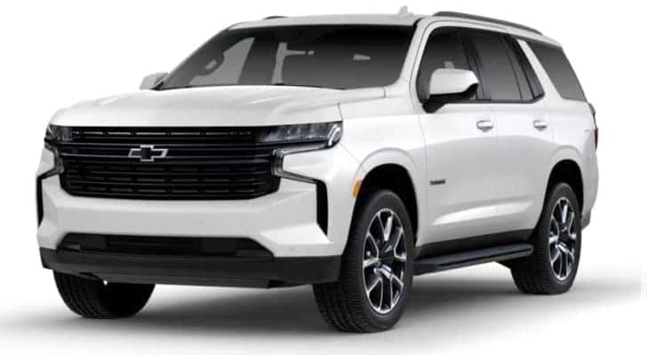 A white 2023 Chevy Tahoe RST is shown angled left.