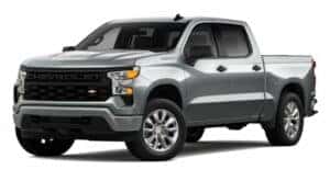 A silver 2023 Chevy Silverado 1500 Custom is angled left.