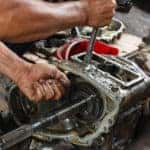 Mechanic servicing a transmission