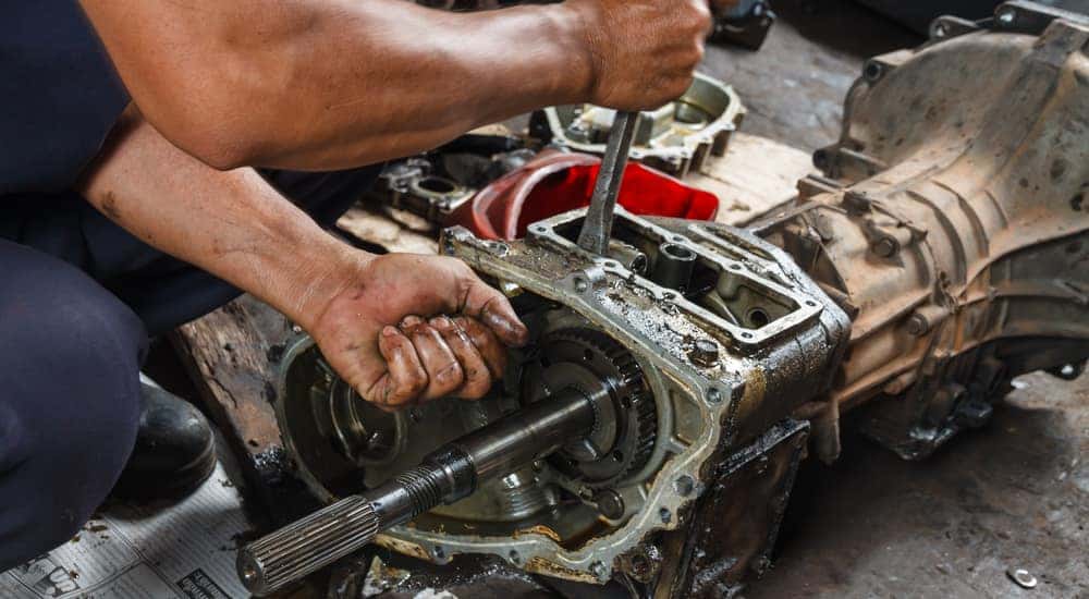Mechanic servicing a transmission