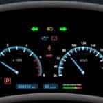 Dashboard of a vehicle with many warning lights lit up