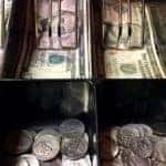 Cash and coins sorted neatly inside the drawer of a register