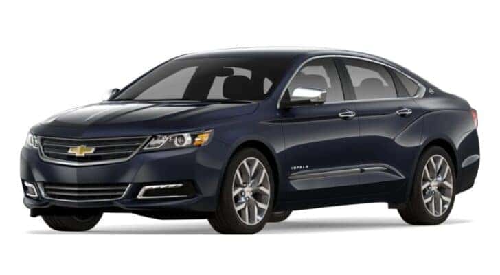 A blue 2016 Chevy Impala is angled left.