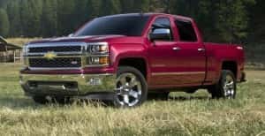 Maroon Chevy Silverado LTZ parked off-road