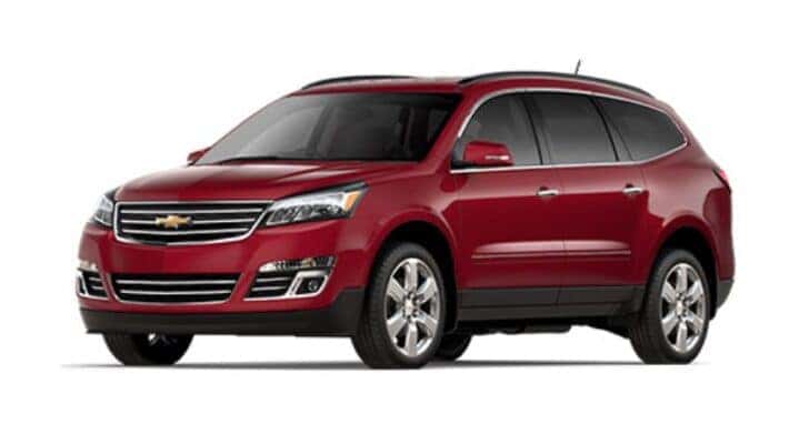 A red 2017 Chevy Traverse is angled left.