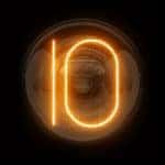 Number "10" lit up digitally by orange lights in the center of a circle against a black background