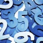 Pile of numbers blue cut out of construction paper