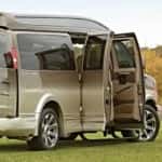 Van parked near a soccer field