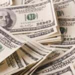Pile of one-hundred dollar bills