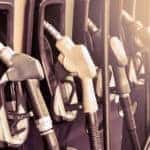 Black and white of four gas pumps at the gas station