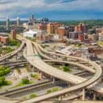 Aerial view of tall Albany NY buildings and twisty Albany streets and bridges