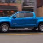 Bright Blue 2019 Chevy Colorado z71 driving in the city