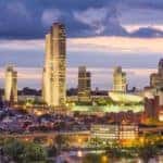 The skyline of Albany, NY is shown.