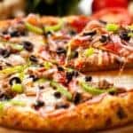 A specialty pizza that you could find in Albany, NY is shown.