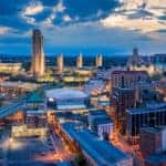 Aerial view of Albany lit up at night