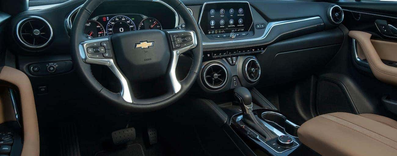 The tan and black interior of a 2020 Chevy Blazer, which wins when comparing 2020 Chevy Blazer vs 2020 Jeep Cherokee.