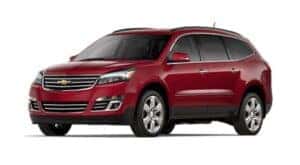 A red 2016 Chevy Traverse is angled left.