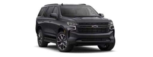 A black 2021 Chevy Tahoe RST is angled right.