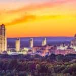 Tall, lit up city buildings in Albany NY