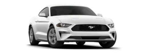 A white 2021 Ford Mustang EcoBoost is angled right.