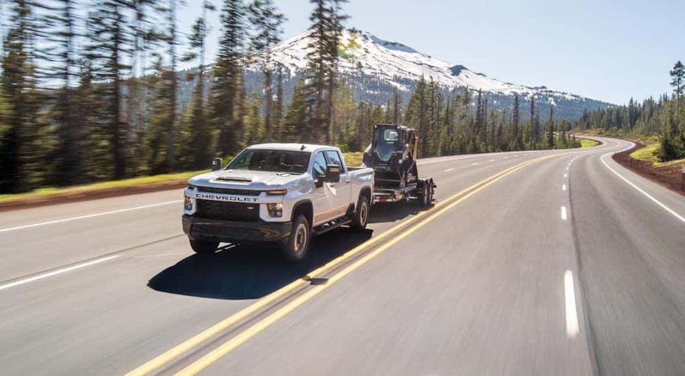 White 2020 Silverado 2500HD towing a trailer top look at Chevy diesel truck for sale near you
