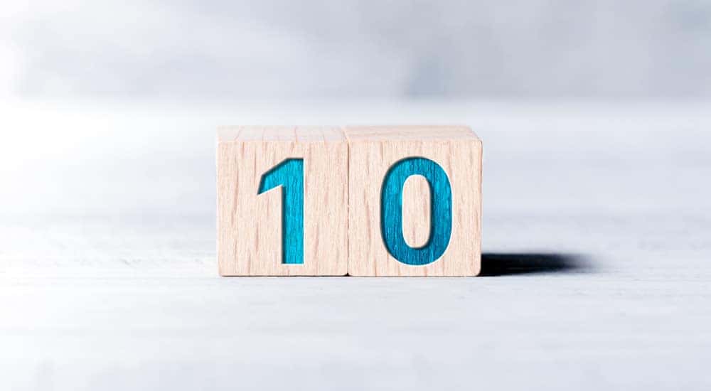 Two brown number blocks that write out the number ten