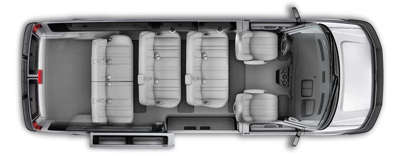 An aerial view is showing the gray interior and seating on a 2021 Chevy Express.