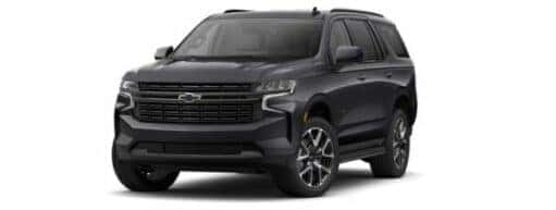 A black 2021 Chevy Tahoe RST is angled left.