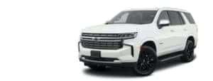 A white 2021 Chevy Tahoe is angled left.