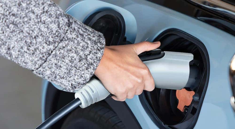A 2022 Chevy Bolt is shown charging.