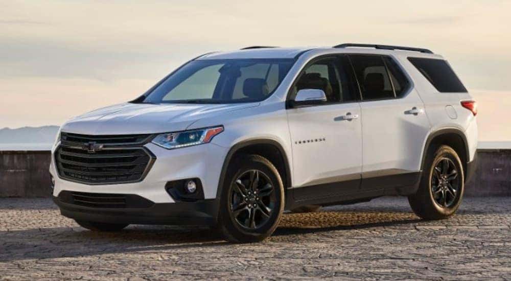 A white 2022 Chevy Equinox is shown from the side.