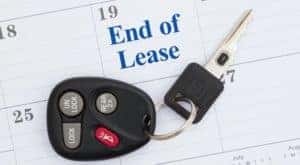 A key is shown placed on a calendar.