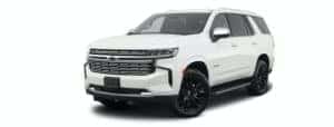 A white 2022 Chevy Tahoe is angled left.
