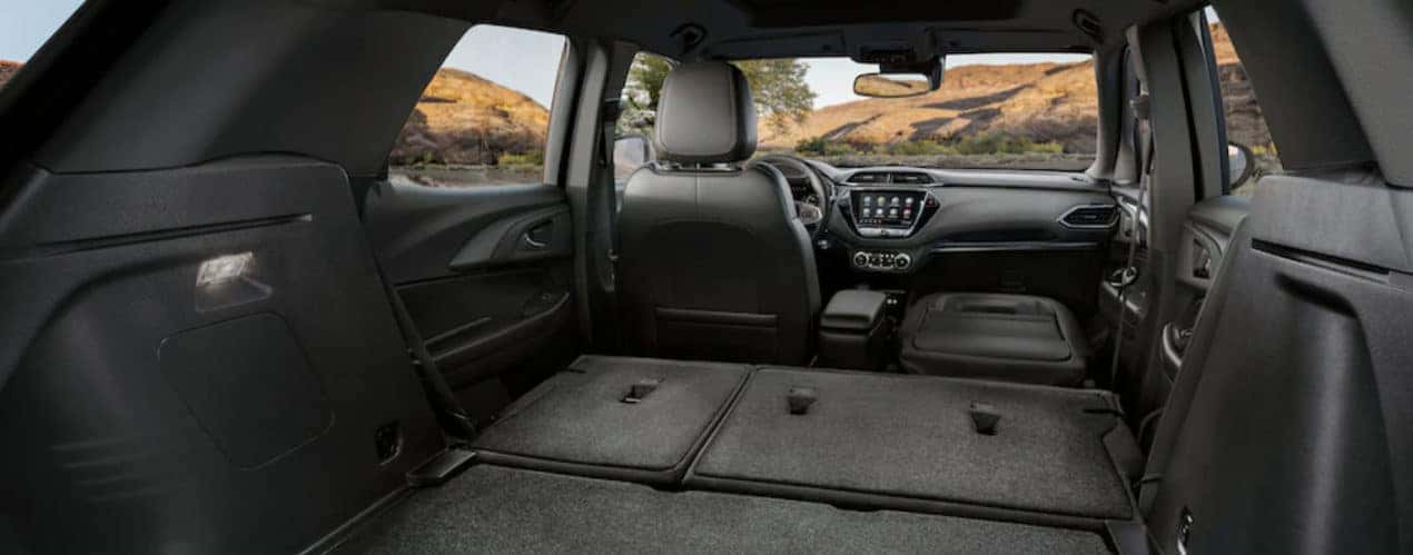 The grey interior of a 2022 Chevy Trailblazer shows a large cargo space during a 2022 Chevy Trailblazer vs 2022 Honda HR-V comparison.