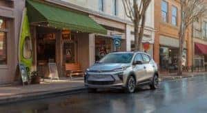 A silver 2022 Chevy Bolt EUV is shown parked on the side of a street.