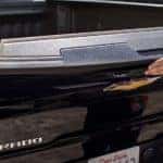 A black 2022 Chevy Silverado 1500 HD Multi Flex tailgate is shown in close up.