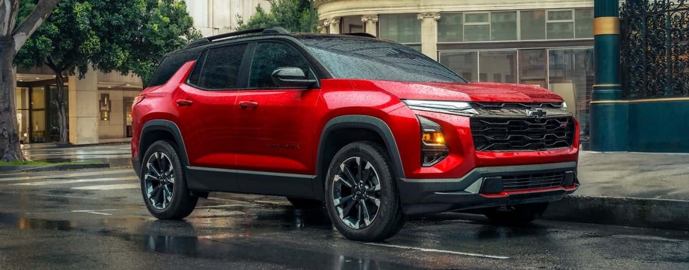 Red 2026 Chevy Equinox RS parked on a city street