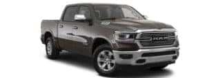 A grey 2023 Ram 1500 is shown angled right.