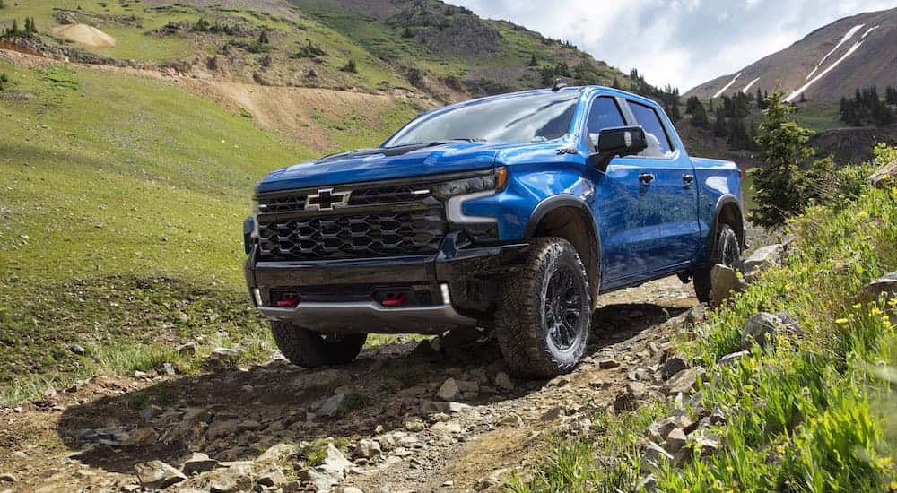 A blue 2023 Chevy Silverado ZR2 is shown from the front at an angle.
