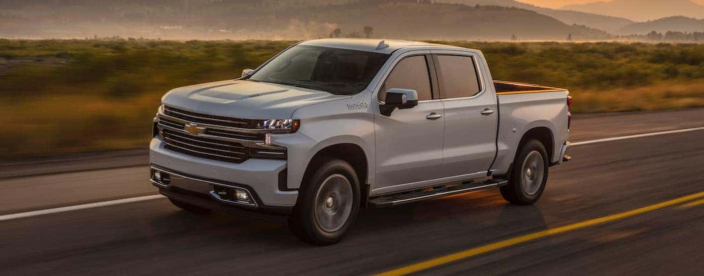 A white 2019 Chevy Silverado 1500 High Country is shown after leaving a Saratoga, NY Certified Pre-Owned chevy truck dealer.