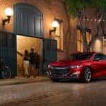 A red 2019 Chevy Malibu is shown from the front at an angle after leaving a Saratoga, NY Chevy Malibu dealer.
